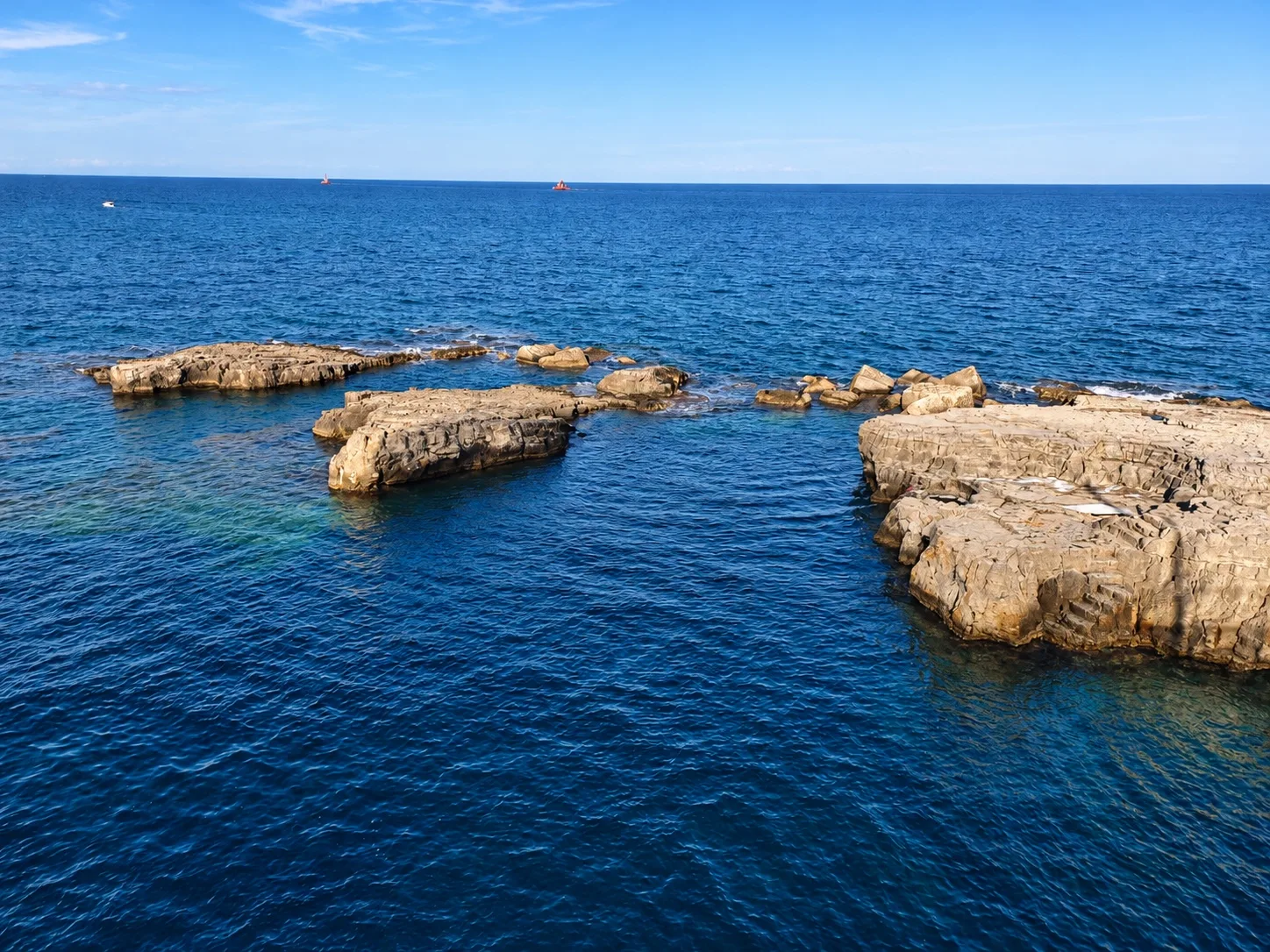 Rocks and open sea at Ortigia